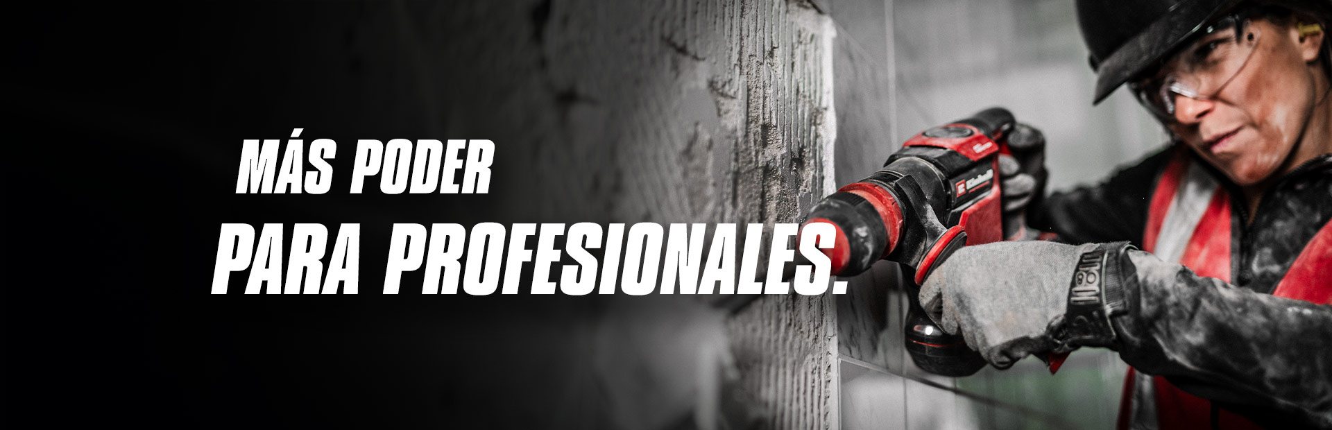 A person wearing safety glasses and a helmet uses a red drill on a wall, with the text "More Power for Pros".