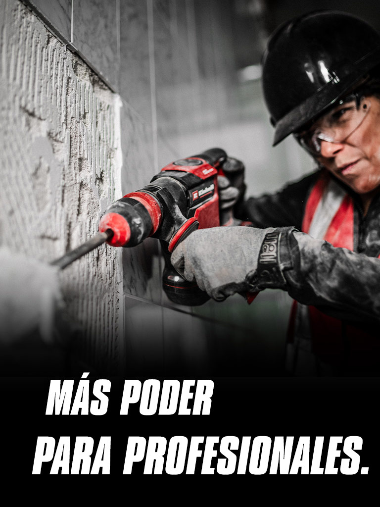 A person wearing safety glasses and a helmet uses a red drill on a wall, with the text "More Power for Pros".
