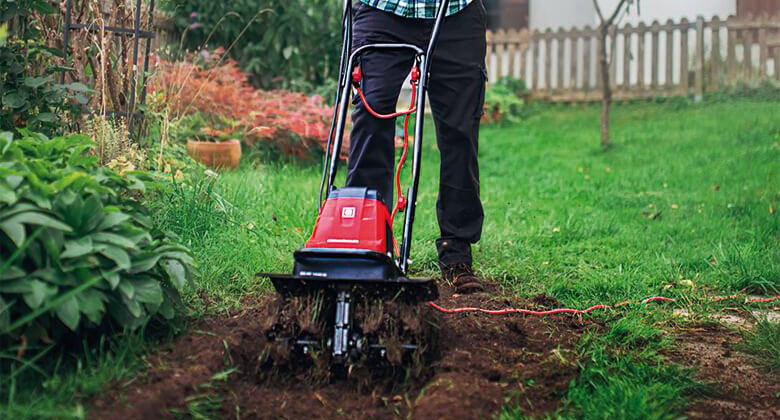 digging a furrow with tiller